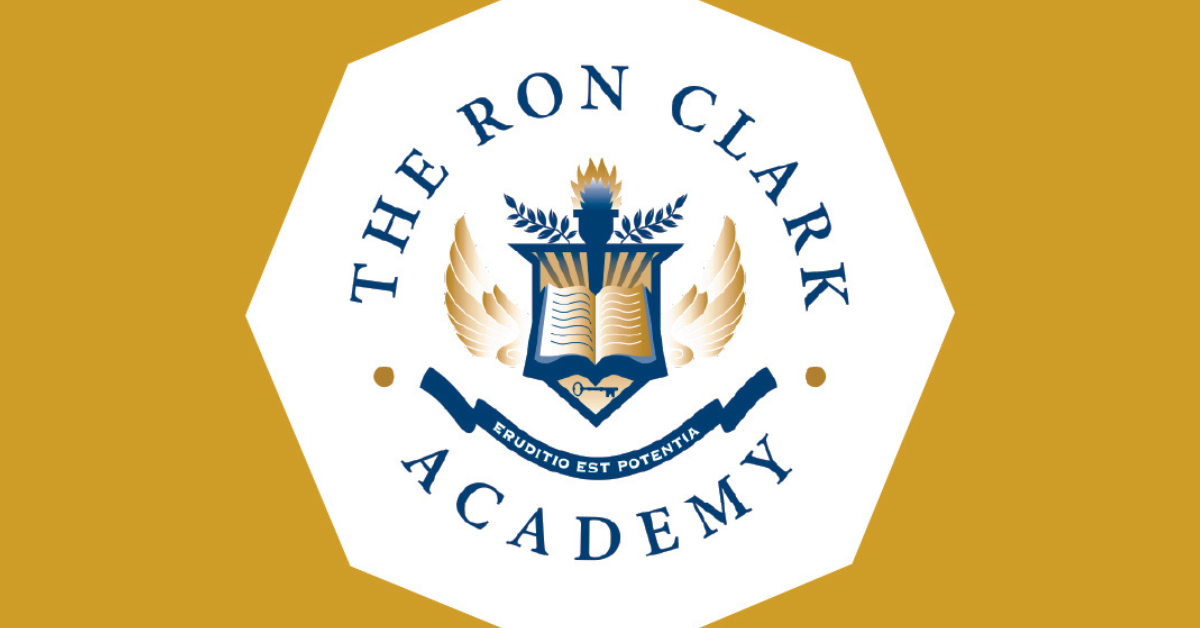gold backgrouns with white hexagon with navy blue writing